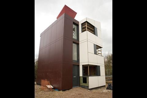The red cladding replaces the primary colours of the original design concept 